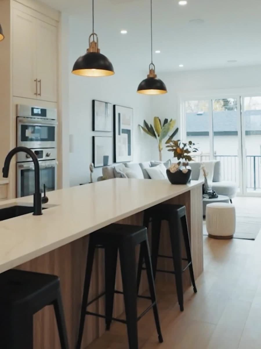 Bright open-plan kitchen and living room from a cinematic house tour